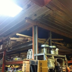 Adams Surplus And Salvage - Pile of stair railings on shelf