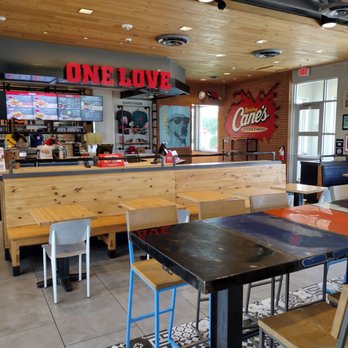 Raising Cane's Chicken Fingers - Interior of restaurant. - Fast Food Near Me - Coon Rapids, Minnesota Raising Cane's Chicken Fingers - Interior of restaurant. - Fast Food Near Me - Coon Rapids, Minnesota
