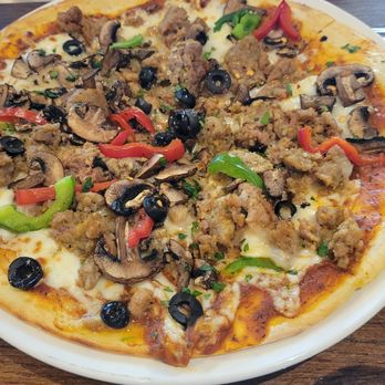 Mangiamo By 604 - Hubby had supreme pizza. All pizzas were $12 from 11a-4p! - Italian Near Me - Honolulu, Hawaii Mangiamo By 604 - Hubby had supreme pizza. All pizzas were $12 from 11a-4p! - Italian Near Me - Honolulu, Hawaii