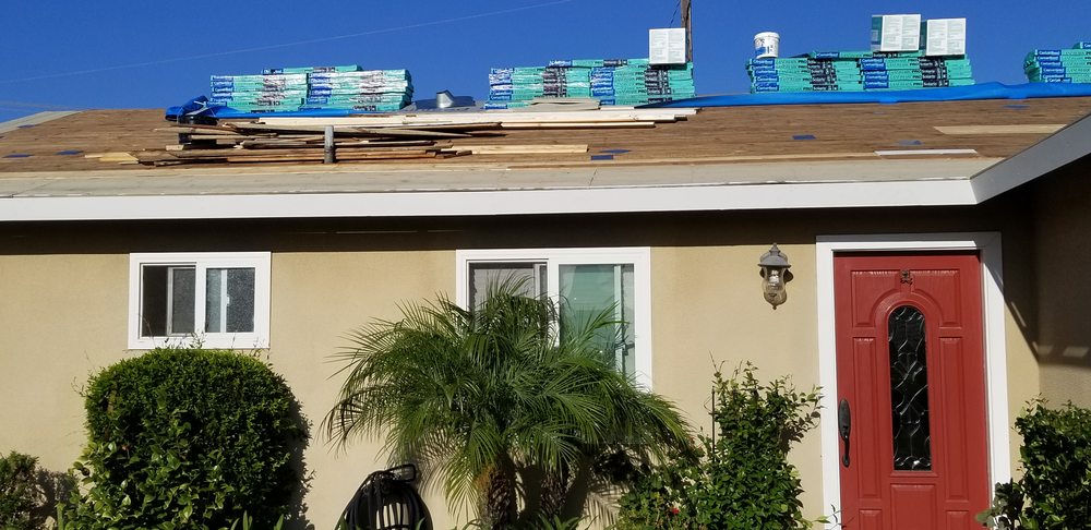 Slide of Tom Byer Roofing Service