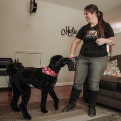 Born to Be Dog Training - Trainer Leah Bornstein working with black dog