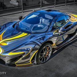 Photo of Sticker City - Sherman Oaks, CA, US. Artistic Black Chrome Mclaren P1 tattoo design wrap.
