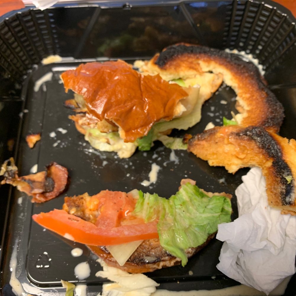 Outback Steakhouse - This is a picture of my burnt grilled chicken sandwich - Steakhouses Near Me - Memphis, Tennessee
