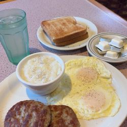 Skyline Restaurant - Grits... eggs over easy and two sausage patties