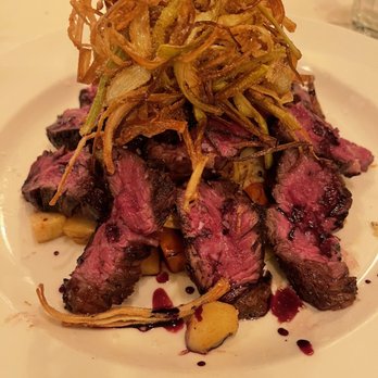 Becco - BISTECCA DI MANZO GRIGLIA Hanger steak grilled medium rare w/ buckwheat polenta, roasted root vegetables w/ fried leeks & red wine reduction - Italian Near Me - New York, New York Becco - BISTECCA DI MANZO GRIGLIA Hanger steak grilled medium rare w/ buckwheat polenta, roasted root vegetables w/ fried leeks & red wine reduction - Italian Near Me - New York, New York