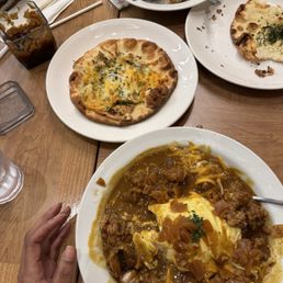 Curry tasted burnt. Naan was burnt and crunchy.