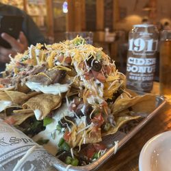 Parker’s Grille & Tap House - Mile high Nachos with pork.