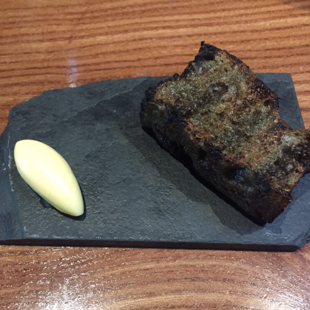 Lazy Bear - Grilled seaweed focaccia - New American Near Me - San Francisco, California Lazy Bear - Grilled seaweed focaccia - New American Near Me - San Francisco, California