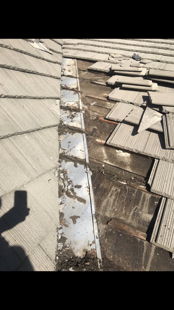 Slide of Alvaro's Roofing