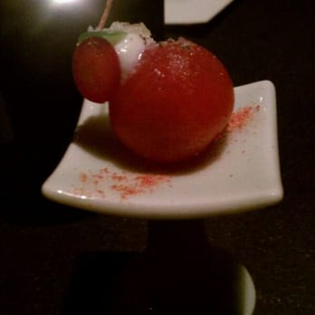 The Aviary - Vodka-infused grape tomato. A play on the Bloody Mary. - Cocktail Bars Near Me - Chicago, Illinois The Aviary - Vodka-infused grape tomato. A play on the Bloody Mary. - Cocktail Bars Near Me - Chicago, Illinois