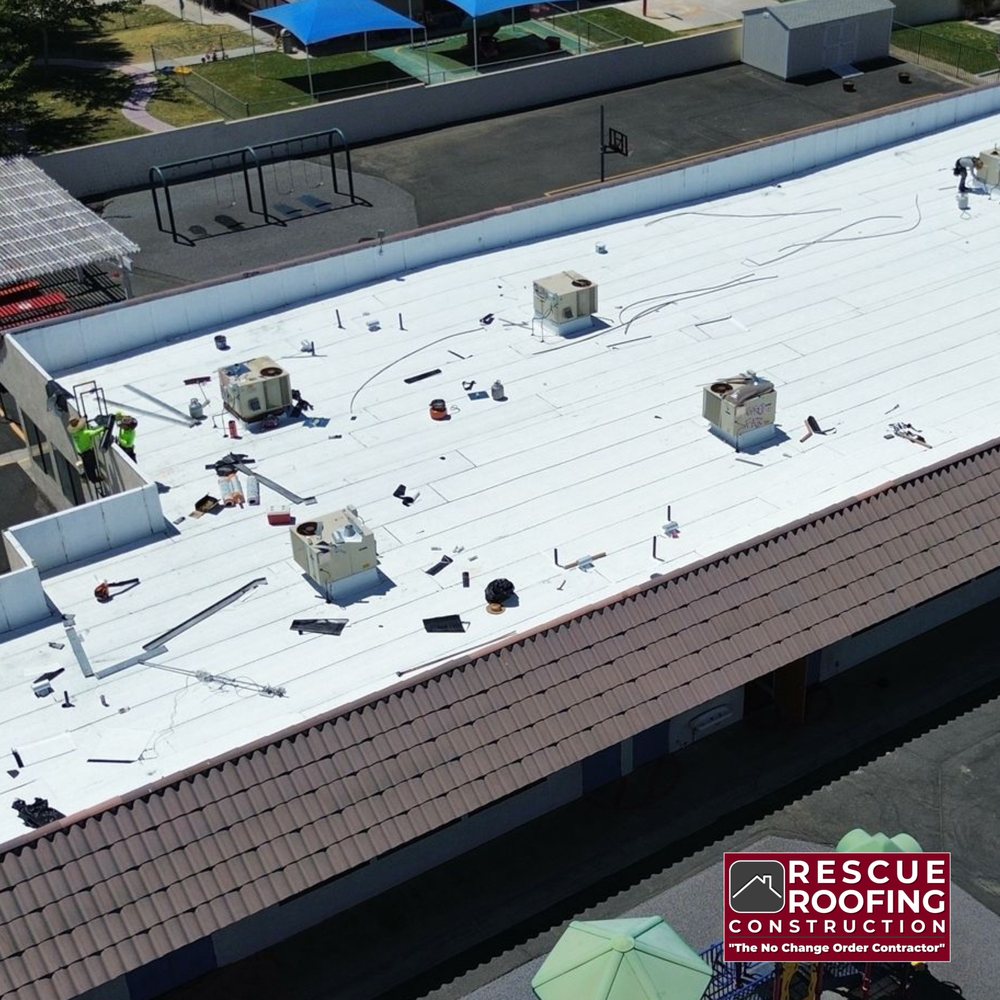 Slide of Rescue Roofing Construction