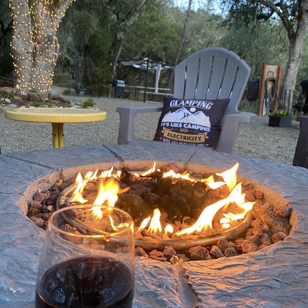 Stay Unhitched - Enjoying some Justin wine by the fire - Vacation Rentals Near Me - Paso Robles, California Stay Unhitched - Enjoying some Justin wine by the fire - Vacation Rentals Near Me - Paso Robles, California