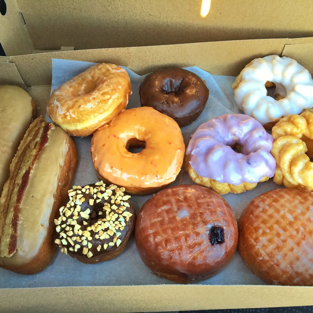 Factory Donuts - Some of the variety that is here. Yes, that is real bacon. - Donuts Near Me - Kirkland, Washington