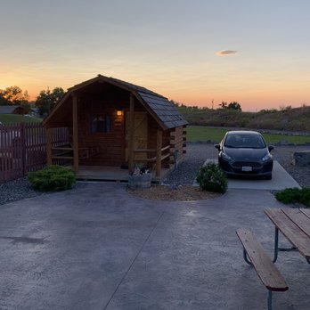 Bozeman Campground & RV Park - Cabin area there is a fire pit on the other side of the picnic table also - Campgrounds Near Me - Bozeman, Montana Bozeman Campground & RV Park - Cabin area there is a fire pit on the other side of the picnic table also - Campgrounds Near Me - Bozeman, Montana