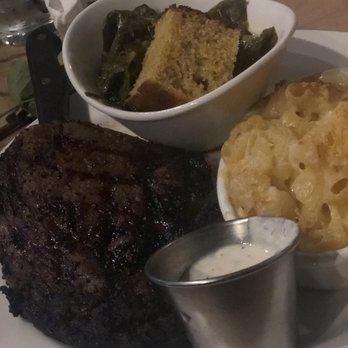 1885 Grill - Ribeye Steak with macaroni and cheese and collards - Seafood Near Me - Chattanooga, Tennessee 1885 Grill - Ribeye Steak with macaroni and cheese and collards - Seafood Near Me - Chattanooga, Tennessee