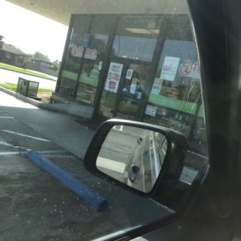 Mother's Nutritional Center - a reflection of a car's side view mirror - Grocery Near Me - Pomona, California