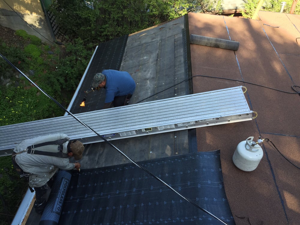 Slide of Miranda's Roofing Partnership