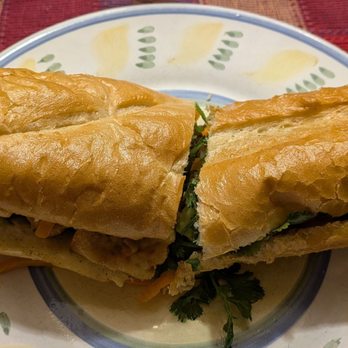 S-Mart Asian Supermarket - 1/2 of a pork and 1/2 of a tofu banh mi (just for the photo, we ordered 1 whole of each) - International Grocery Near Me - Bellevue, Washington S-Mart Asian Supermarket - 1/2 of a pork and 1/2 of a tofu banh mi (just for the photo, we ordered 1 whole of each) - International Grocery Near Me - Bellevue, Washington