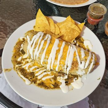 Chelas Mexican Kitchen - Carnitas burrito | Packed full of carnitas, rice and special sauce. - New Mexican Cuisine Near Me - San Clemente, California Chelas Mexican Kitchen - Carnitas burrito | Packed full of carnitas, rice and special sauce. - New Mexican Cuisine Near Me - San Clemente, California