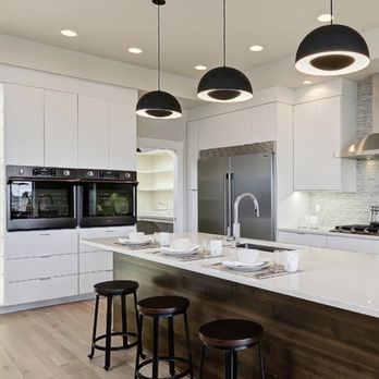 26 Builders - a modern kitchen with a large island - General Contractors Near Me