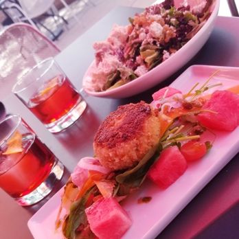 Drunken Goat - Negronis, chicken salad, and watermelon salad topped with a melt-in-your-mouth salmon cake. - Salad Near Me - Edwards, Colorado