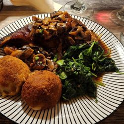 Vidalia Restaurant - Pork Chop Fico - pork chop, glaze sauce with mushrooms and figs, sauteed spinach and potato croquettes