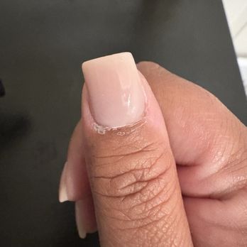 Tulip Nails & Spa - Does anyone else see how it curves on the left top corner?? the tip was too big for my nail width. - Nail Salons Near Me - Brentwood, California Tulip Nails & Spa - Does anyone else see how it curves on the left top corner?? the tip was too big for my nail width. - Nail Salons Near Me - Brentwood, California