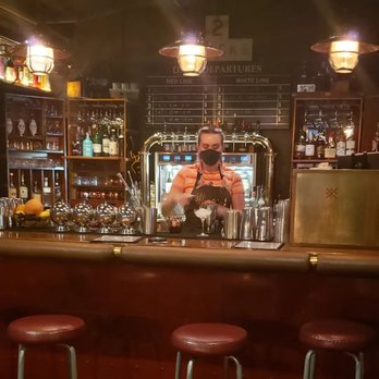 Anaheim Packing District - This bartender is making us drinks in a train/bar - Landmarks & Historical Buildings Near Me - Anaheim, California Anaheim Packing District - This bartender is making us drinks in a train/bar - Landmarks & Historical Buildings Near Me - Anaheim, California