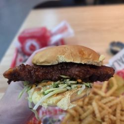 The Red Bird - $12.99 Two sandwiches with fries - Extra Hot is a 1/10 on the spicy scale