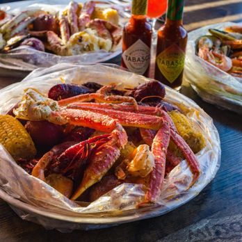 Crab Du Jour - a plate of crab legs and potatoes - Seafood Near Me - Asheville, North Carolina Crab Du Jour - a plate of crab legs and potatoes - Seafood Near Me - Asheville, North Carolina