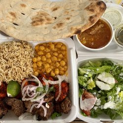 Kabul Kabob House - Super dish includes 3 different kabobs, rice, meat sauce, salad, chickpeas and naan! Enough food for 2 people easily!