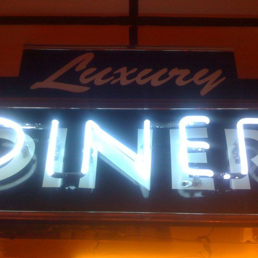Luxury Diner - Sign above the bar with a hanging sign reading, "If Momma Ain't Happy, Ain't Nobody Happy!" - Diners Near Me - Cheyenne, Wyoming Luxury Diner - Sign above the bar with a hanging sign reading, "If Momma Ain't Happy, Ain't Nobody Happy!" - Diners Near Me - Cheyenne, Wyoming