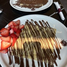 Chocolate crepes with strawberries Chocolate crepes with strawberries
