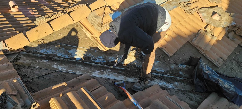 Slide of Do It All Roofing