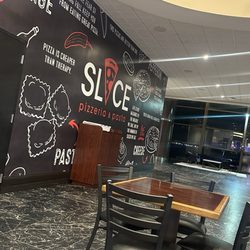 Slice Pizzeria and Pasta - Quite a bit of tables to choose from in front of slice but there is also seating near the windows overlooking the lake