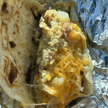 Pflugerville Taco House - Potato, egg, bacon and cheese taco. - Mexican Near Me - Pflugerville, Texas Pflugerville Taco House - Potato, egg, bacon and cheese taco. - Mexican Near Me - Pflugerville, Texas