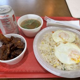 Tocilog - Tocino(cured pork) with fried rice and eggs. Your typical Filipino breakfast. And with a side sinigaang(tamarind) soup Tocilog - Tocino(cured pork) with fried rice and eggs. Your typical Filipino breakfast. And with a side sinigaang(tamarind) soup