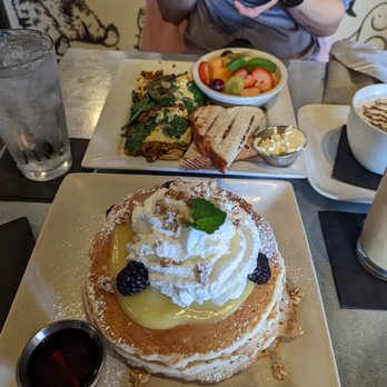 Toast - Lemon berry pancakes and omelette in the back. - Breakfast & Brunch Near Me - Temecula, California Toast - Lemon berry pancakes and omelette in the back. - Breakfast & Brunch Near Me - Temecula, California