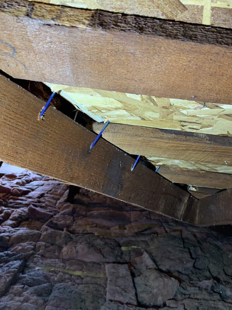 Slide of Ridout Roofing