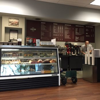 Lakeside Cafe & Deli - a man standing in front of a deli counter - Cafes Near Me - Columbia, Maryland Lakeside Cafe & Deli - a man standing in front of a deli counter - Cafes Near Me - Columbia, Maryland