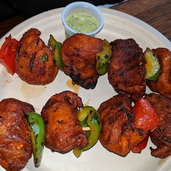 Momo Crave - ~ Tandoori Momo - fried momo marinated w.special tandoori masala and grilled w.mixed peppers & onions. - Himalayan/Nepalese Near Me - Woodside, New York Momo Crave - ~ Tandoori Momo - fried momo marinated w.special tandoori masala and grilled w.mixed peppers & onions. - Himalayan/Nepalese Near Me - Woodside, New York