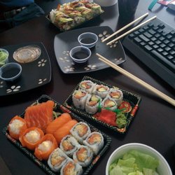 Sushi Station - 2 Black dragon rolls (top) Salmon avocado roll (middle) Salmon set (bottom)