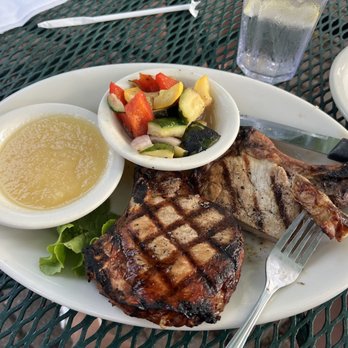 Clara's On the River - Port Charbroiled Pork Chop Dinner - American Near Me - Battle Creek, Michigan Clara's On the River - Port Charbroiled Pork Chop Dinner - American Near Me - Battle Creek, Michigan