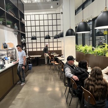 Chopsmith - people sitting at tables in a restaurant - Salad Near Me - Washington, DC, District of Columbia
