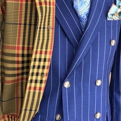 Anthony Men's Shop - Double breasted suit layer with bold plaid rain coat