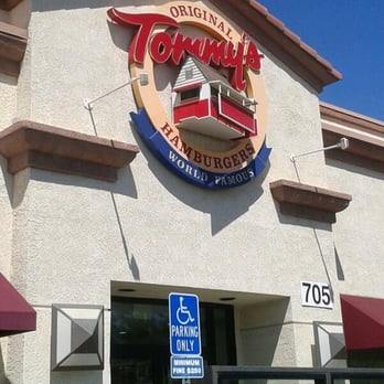 Original Tommy's - The restaurant front store logo is 3-D and stands out with a multitude of colors. The coarse walls have tiny shadows from all the sunshine. - Burgers Near Me - Palmdale, California Original Tommy's - The restaurant front store logo is 3-D and stands out with a multitude of colors. The coarse walls have tiny shadows from all the sunshine. - Burgers Near Me - Palmdale, California