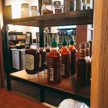 Modern Market Eatery - Condiment shelf with fountain craft soda behind. - Sandwiches Near Me - Phoenix, Arizona Modern Market Eatery - Condiment shelf with fountain craft soda behind. - Sandwiches Near Me - Phoenix, Arizona