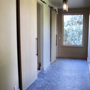 CFI Construction - a hallway with sliding doors - General Contractors Near Me CFI Construction - a hallway with sliding doors - General Contractors Near Me