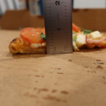 Slice Heaven - Small Paneer Tikka Lovers Pizza slice, side ruler - Chicken Wings Near Me - Cleveland, Tennessee