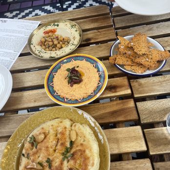 Shukette - Dips (hummus and feta) and pita and flaxseed crackers - Middle Eastern Near Me - New York, New York Shukette - Dips (hummus and feta) and pita and flaxseed crackers - Middle Eastern Near Me - New York, New York